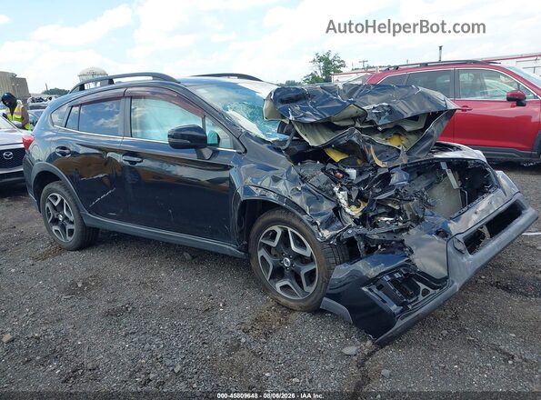 JF2GTAMC7JH235421 2018 SUBARU CROSSTREK Black Rear interior view