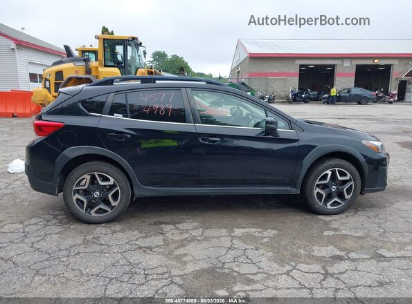 JF2GTAMCXJH215552 2018 SUBARU CROSSTREK Black Rear interior view