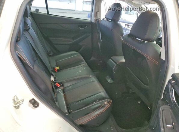 JF2GTHNC3MH682369 2021 SUBARU CROSSTREK White Vista interior trasera
