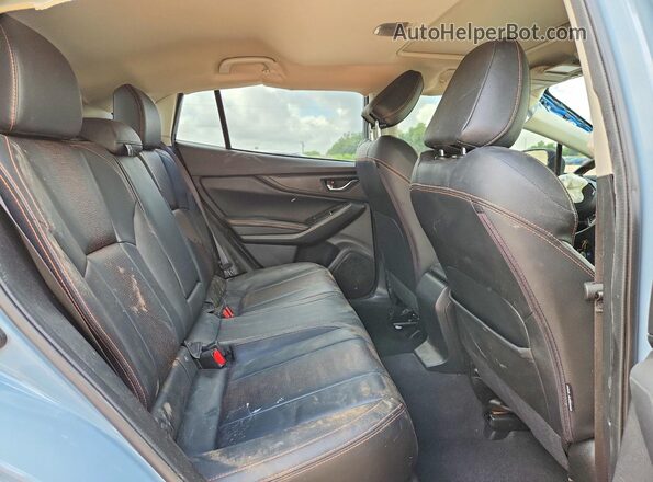 JF2GTHNC6M8304708 2021 SUBARU CROSSTREK Blue Սալոնի հետևի տեսք
