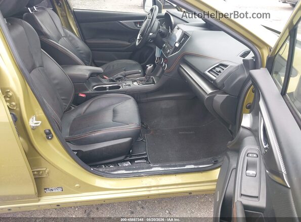 JF2GTHNC6MH307494 2021 SUBARU CROSSTREK Green Front interior view