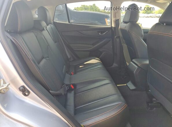 JF2GTHNC7M8202575 2021 SUBARU CROSSTREK Silver Rear interior view