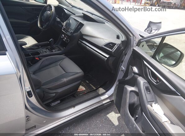 JF2GTHSC6PH233339 2023 SUBARU CROSSTREK Silver Front interior view
