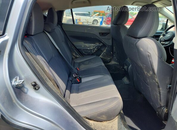 JF2GUABC2R8893577 2024 SUBARU CROSSTREK Silver Vista interior trasera