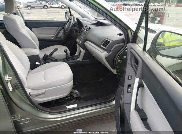 JF2SJAAC1GG467113 2016 SUBARU FORESTER Green წინა სალონის ხედი