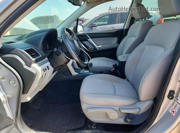 JF2SJABC0GH410538 2016 SUBARU FORESTER Silver Front interior view