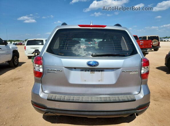 JF2SJABC0GH410538 2016 SUBARU FORESTER Silver Rear view