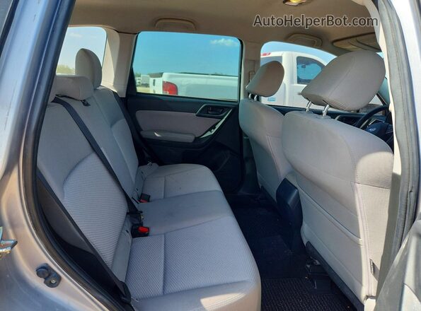JF2SJABC0GH410538 2016 SUBARU FORESTER Silver Rear interior view