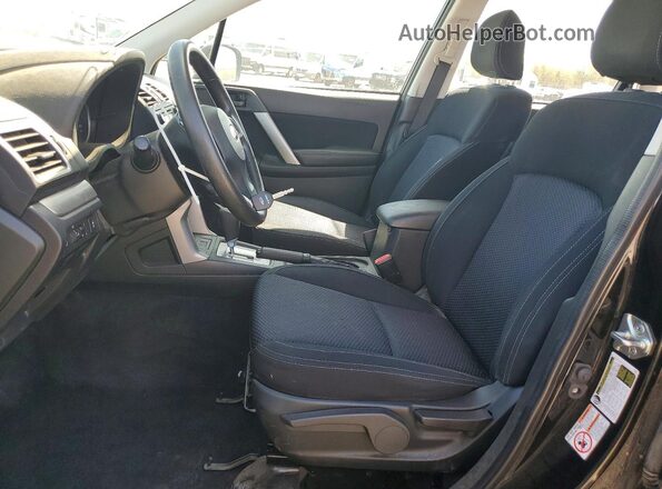 JF2SJABC0GH468097 2016 SUBARU FORESTER Black Front interior view