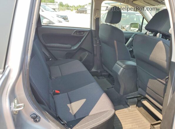 JF2SJABC6JH516015 2018 SUBARU FORESTER Silver Rear interior view