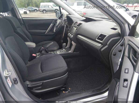 JF2SJABC6JH540329 2018 SUBARU FORESTER Silver Front interior view