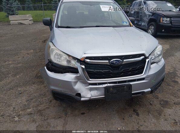 JF2SJABC6JH540329 2018 SUBARU FORESTER Silver Front view
