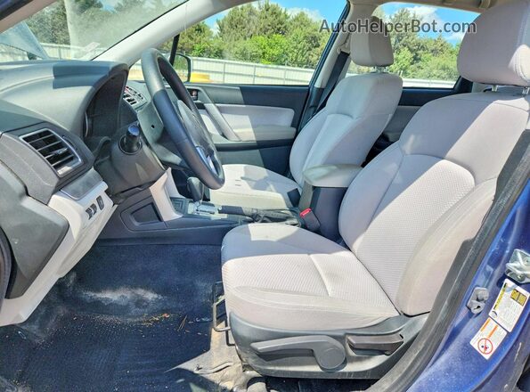 JF2SJABC7HH412305 2017 SUBARU FORESTER Blue Vista interior delantera