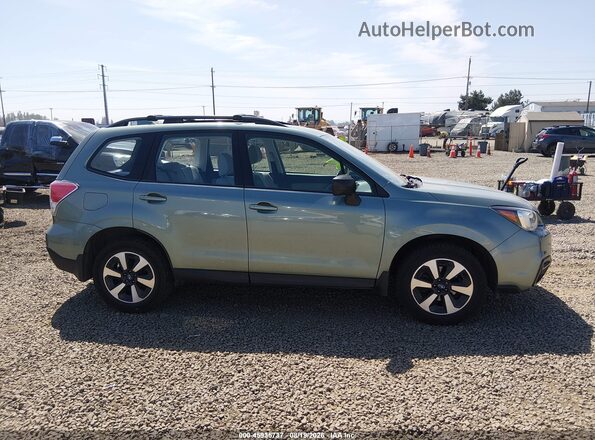 JF2SJABC7HH475663 2017 SUBARU FORESTER Green Սալոնի հետևի տեսք