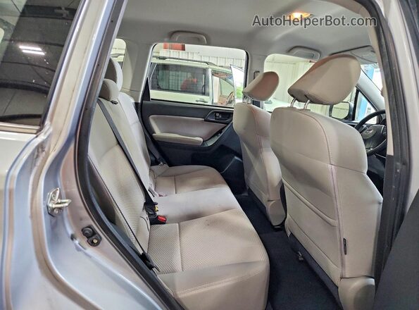 JF2SJABC8GH467182 2016 SUBARU FORESTER Silver Rear interior view