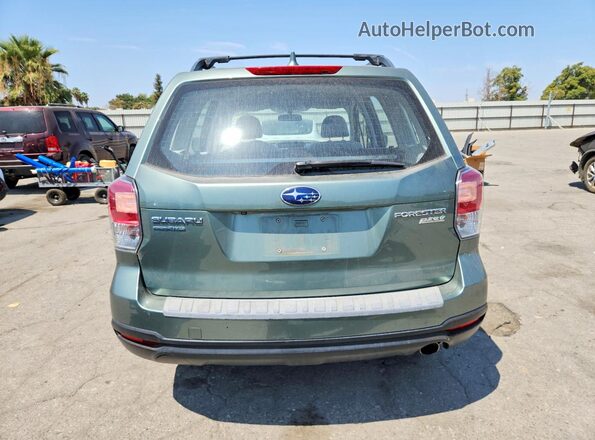 JF2SJABC9HH809952 2017 SUBARU FORESTER Teal Widok z tyłu