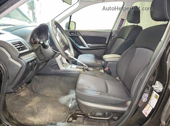 JF2SJADC1GH464279 2016 SUBARU FORESTER Black Front interior view