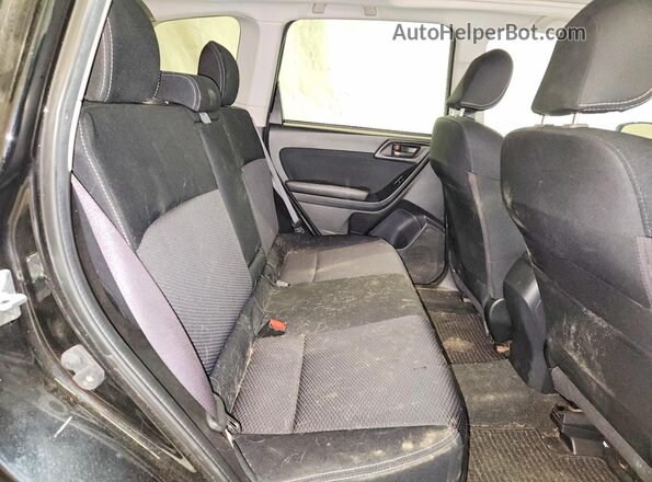 JF2SJADC1GH464279 2016 SUBARU FORESTER Black Rear interior view