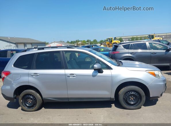 JF2SJADC1GH540955 2016 SUBARU FORESTER Silver Սալոնի հետևի տեսք