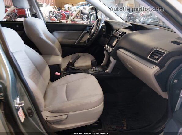JF2SJADC2GH494598 2016 SUBARU FORESTER Green Вид салону спереду