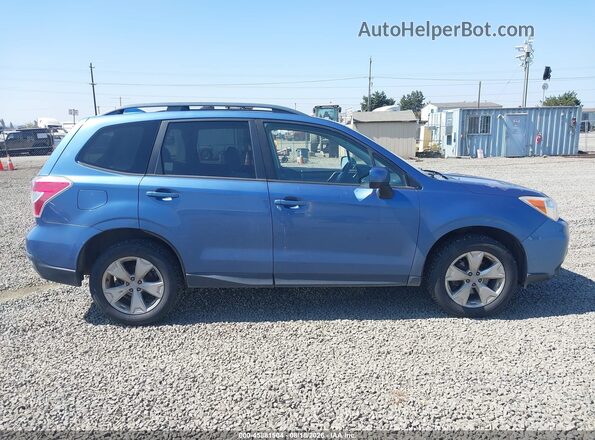 JF2SJADC2GH521587 2016 SUBARU FORESTER Blue Rear interior view