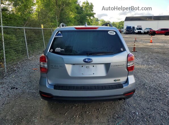 JF2SJADC3GH438301 2016 SUBARU FORESTER Серебряный Вид сзади