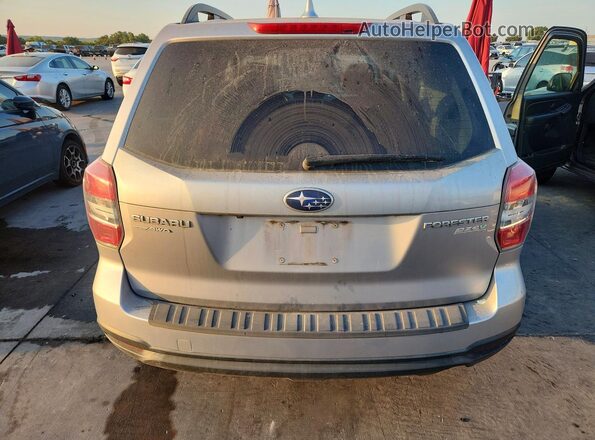 JF2SJADC3GH559619 2016 SUBARU FORESTER Silver Вид задніх сидінь
