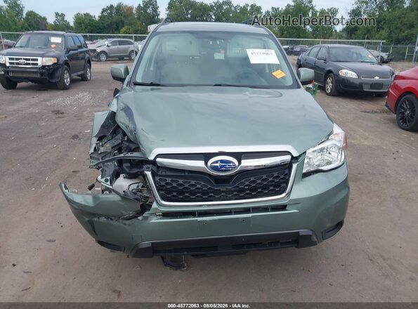 JF2SJADC5GH401427 2016 SUBARU FORESTER Green Rear interior view