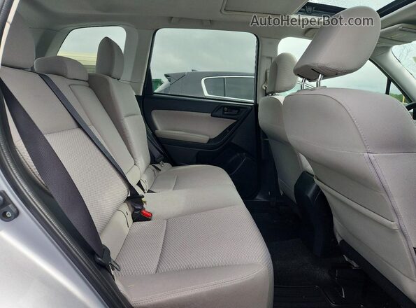 JF2SJADC5GH409009 2016 SUBARU FORESTER Silver Rear interior view