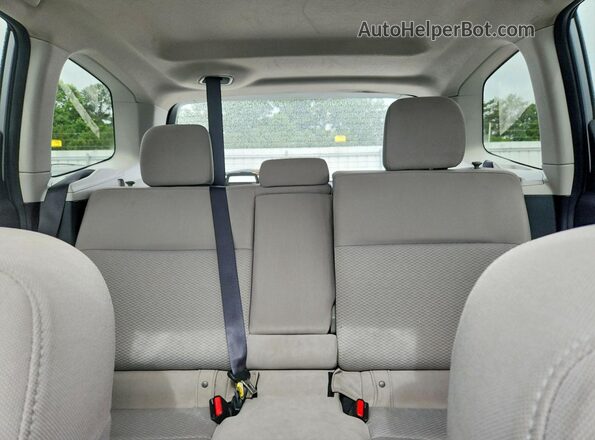 JF2SJADC5GH409009 2016 SUBARU FORESTER Silver Rear seats view