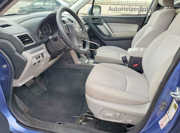 JF2SJADC5GH534883 2016 SUBARU FORESTER Blue Widok wnętrza z przodu