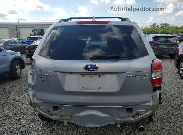 JF2SJADC5GH561713 2016 SUBARU FORESTER Silver Vista trasera