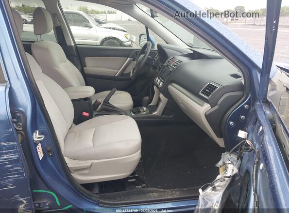 JF2SJADC6GH451642 2016 SUBARU FORESTER Blue Front interior view