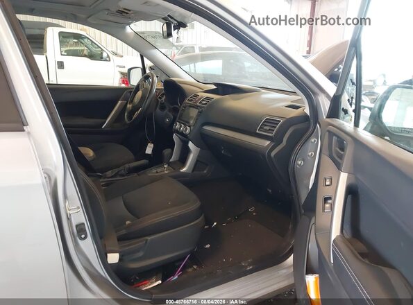 JF2SJADC6GH557735 2016 SUBARU FORESTER Silver Front interior view