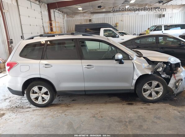 JF2SJADC6GH557735 2016 SUBARU FORESTER Silver Rear interior view