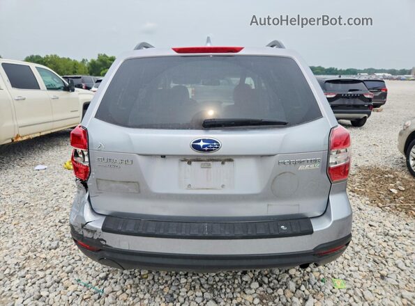 JF2SJADC7GH428175 2016 SUBARU FORESTER Silver Rear view