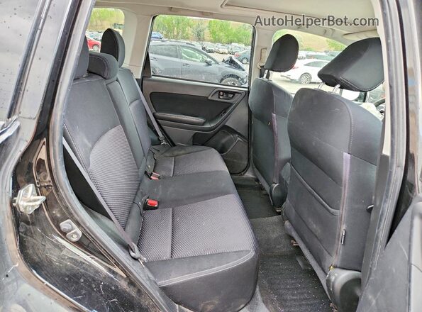 JF2SJADC7GH433862 2016 SUBARU FORESTER Black Widok wnętrza z tyłu
