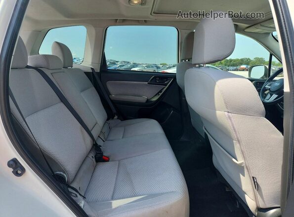 JF2SJADC7HH405397 2017 SUBARU FORESTER White Rear interior view