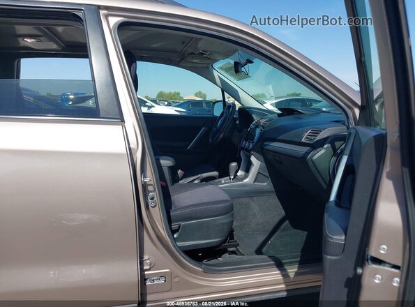 JF2SJADC8GH428170 2016 SUBARU FORESTER Gold Вид салону спереду