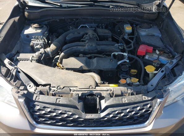 JF2SJADC8GH428170 2016 SUBARU FORESTER Gold Вид ззаду