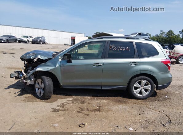 JF2SJADCXGH552277 2016 SUBARU FORESTER Green Rear interior view