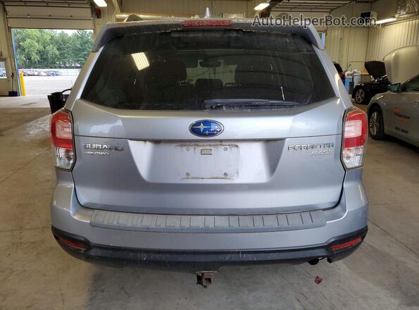 JF2SJAEC5HH585705 2017 SUBARU FORESTER Silver Rear view