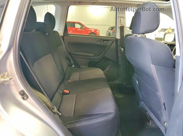 JF2SJAEC5HH585705 2017 SUBARU FORESTER Silver Rear interior view