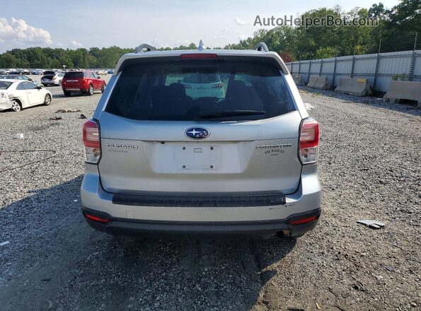 JF2SJAEC6JH599022 2018 SUBARU FORESTER Silver Vista trasera
