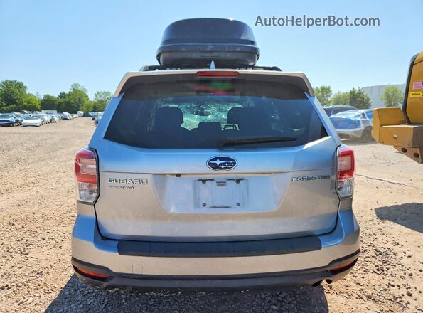 JF2SJAEC7JH499611 2018 SUBARU FORESTER Silver Rear view