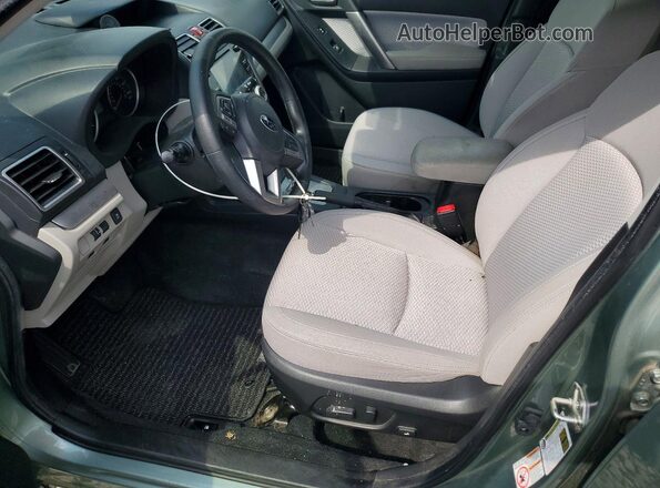 JF2SJAEC8JH431561 2018 SUBARU FORESTER Green Front interior view