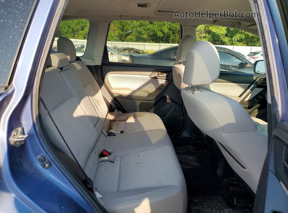JF2SJAEC8JH610229 2018 SUBARU FORESTER Blue Vista interior trasera