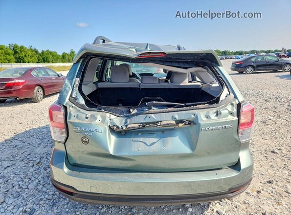 JF2SJAEC9JH567844 2018 SUBARU FORESTER Silver Rear view