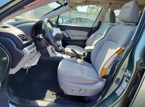 JF2SJAFC3GH458920 2016 SUBARU FORESTER Green Front interior view