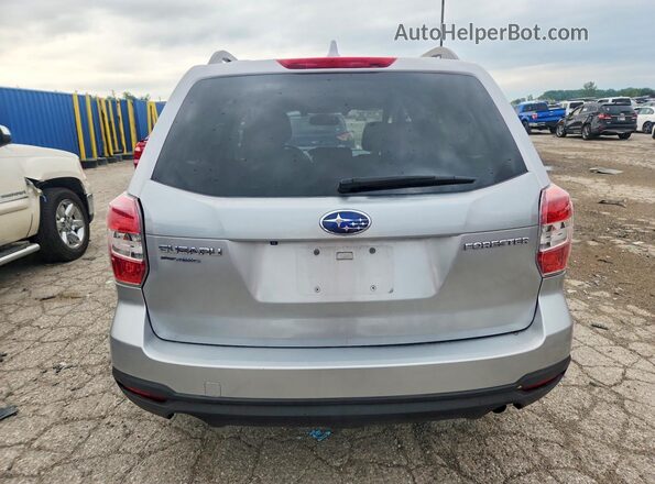 JF2SJAFC7GH559846 2016 SUBARU FORESTER Silver Vista trasera